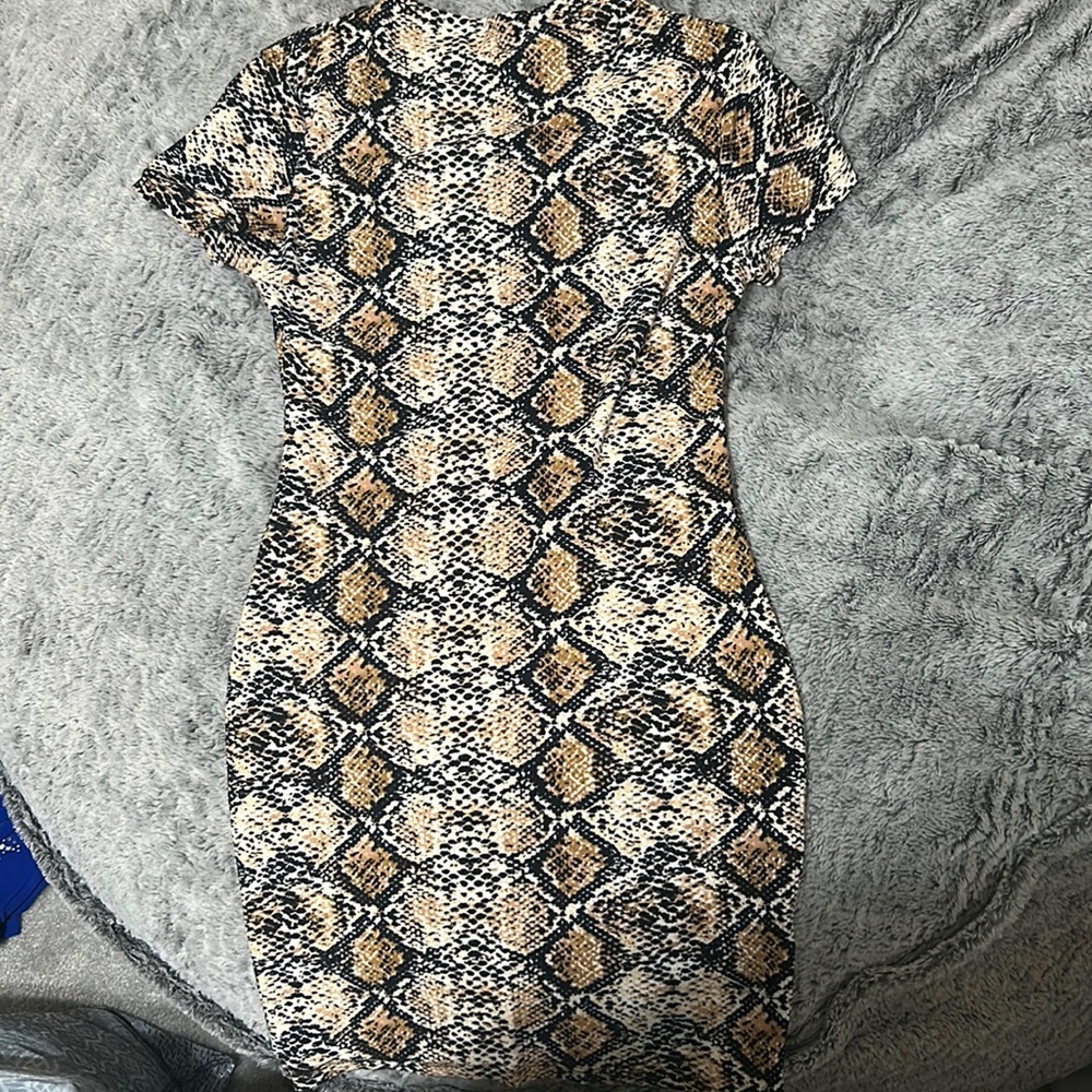 body con dress with snakeskin print.